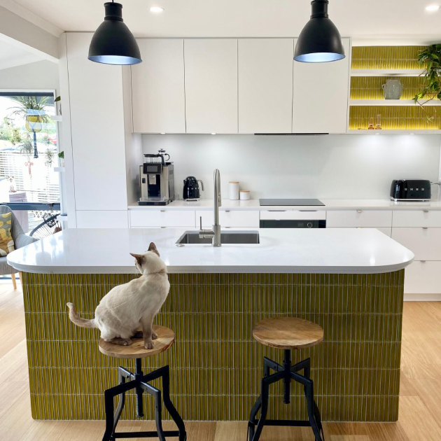 Kitchen with pantry doors open